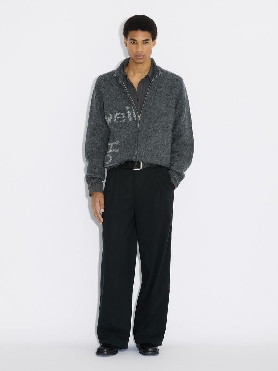 haza logo wollstrickjacke