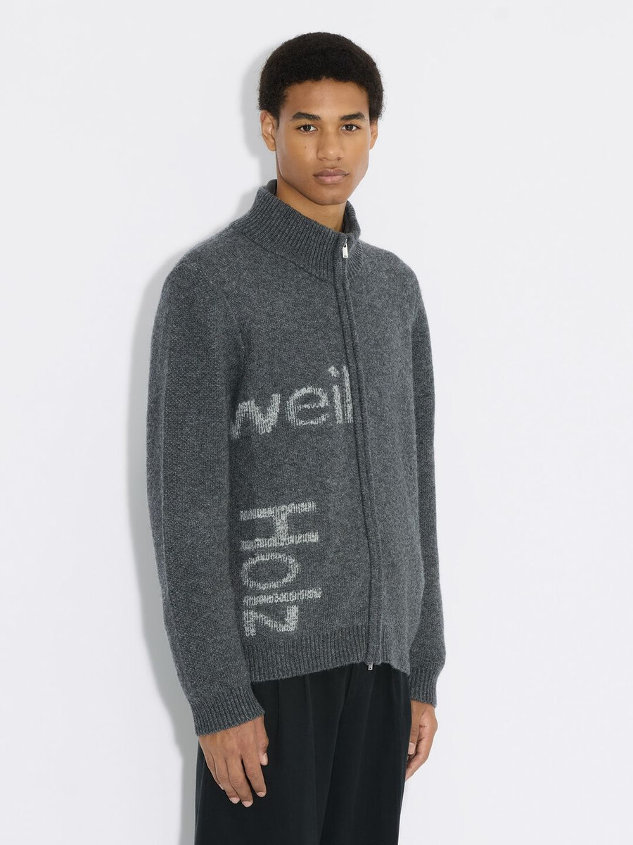 haza logo wollstrickjacke